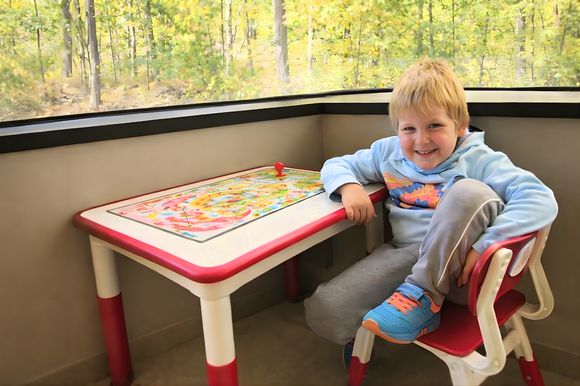 Kid with arms raised