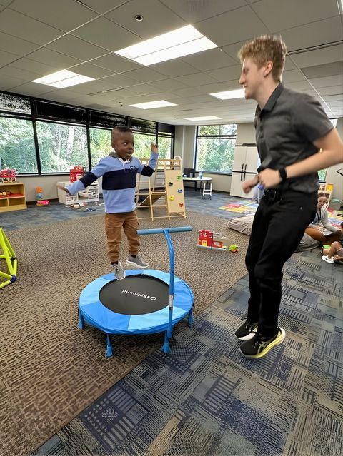 Boy playing in exercise area at ABA clinic